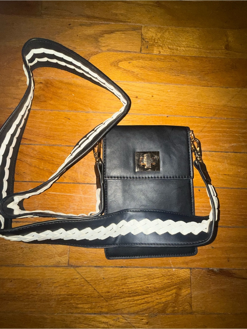 Compact Black Mini Crossbody with Contrasting Woven Strap